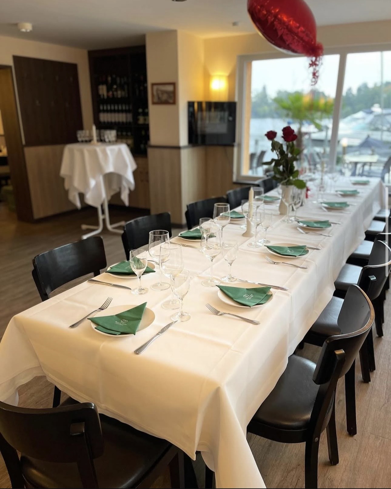 Trattoria di Mare interior with waterfront view